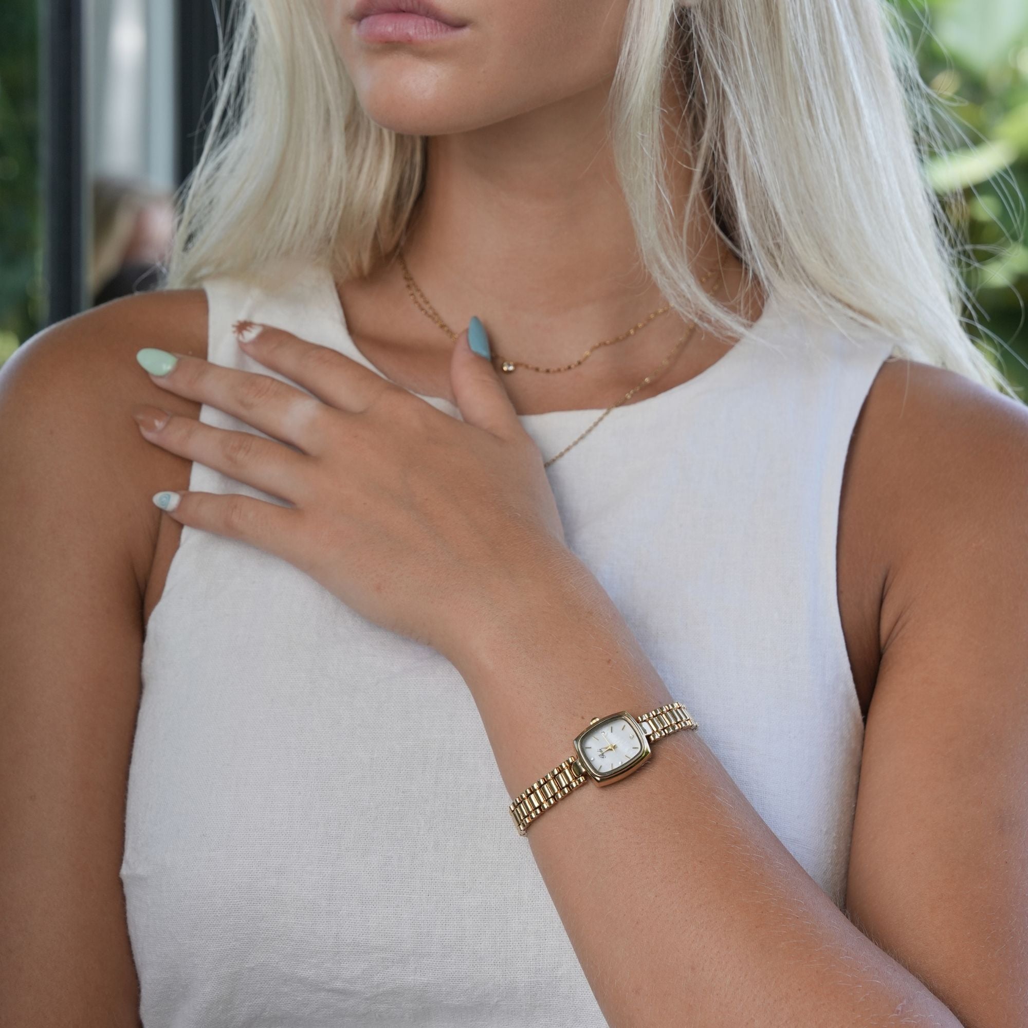 Elegant Women's Watch Gold Rectangular Design with Pearl White Dial